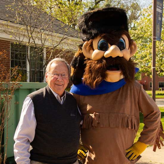 faculty with a mascot